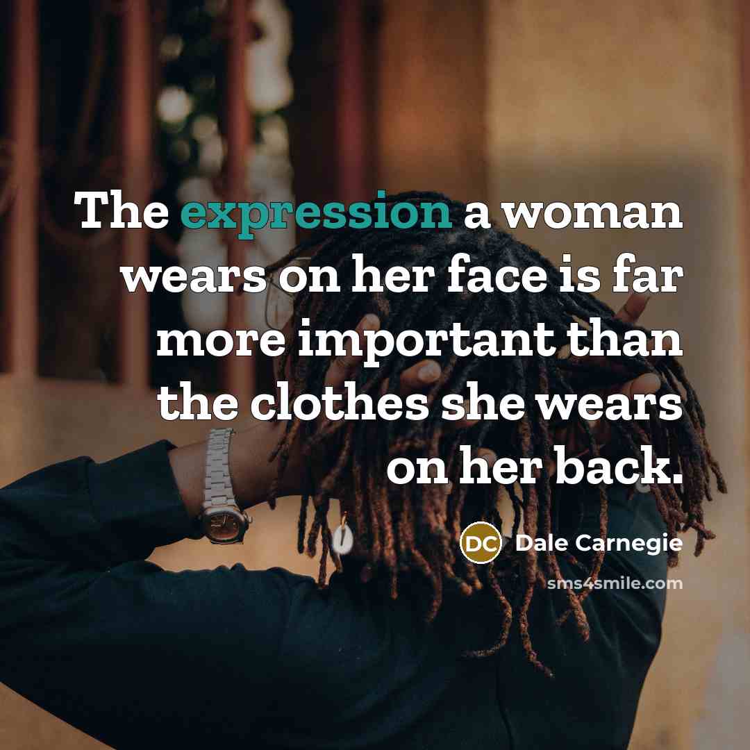 “The expression a woman wears on her face is far…” quote by Dale Carnegie