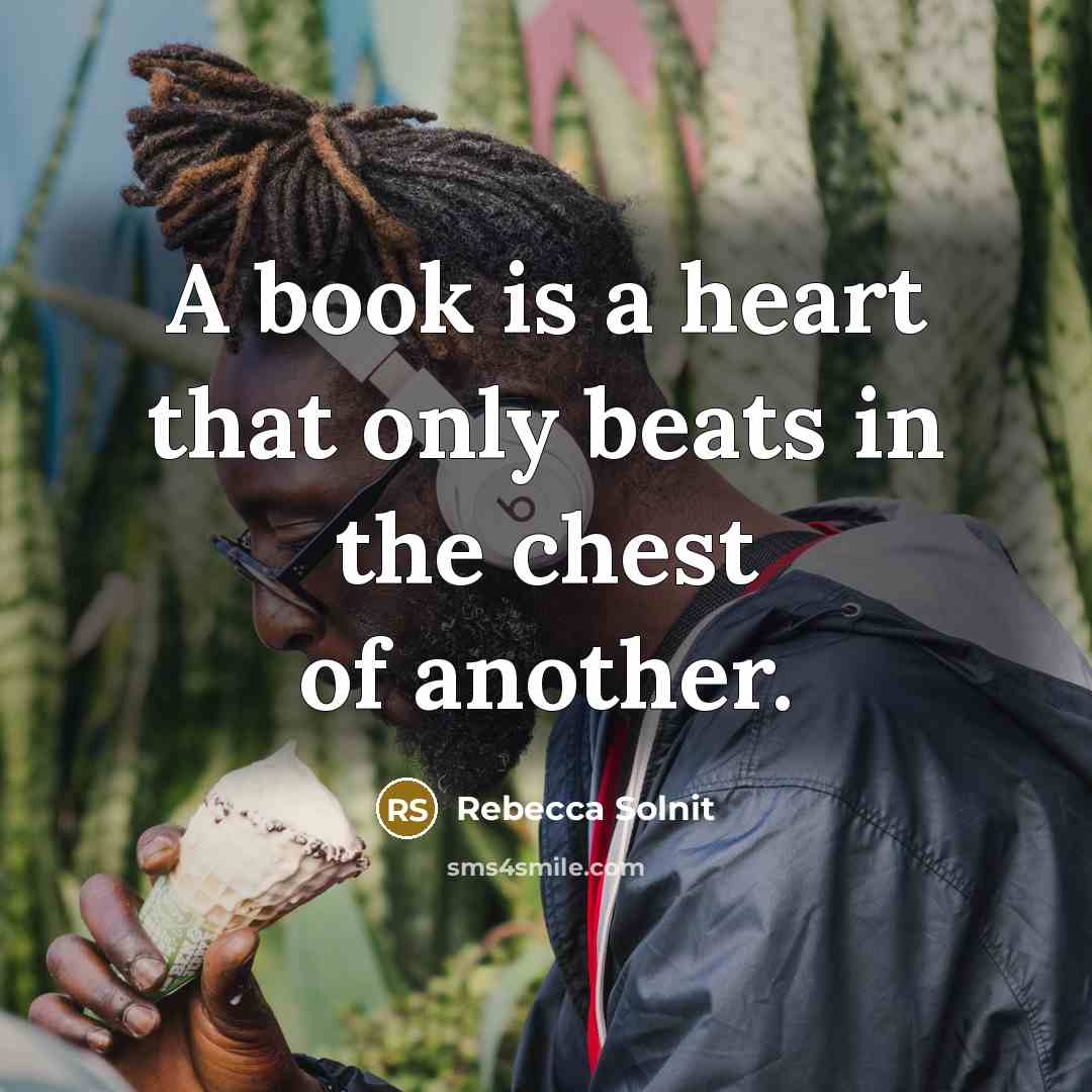 “A book is a heart that only beats in the…” quote by Rebecca Solnit