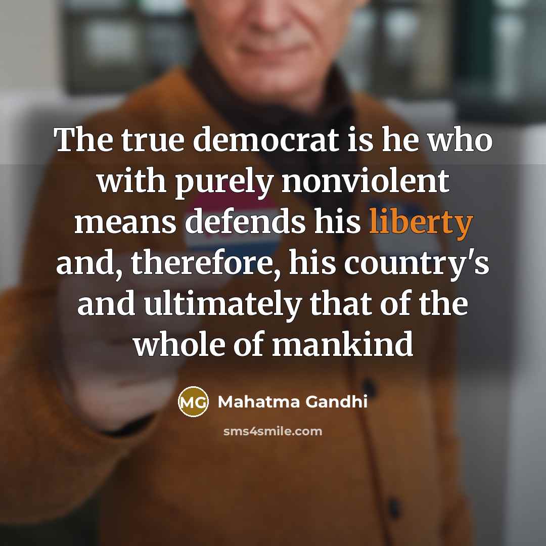 “The true democrat is he who with purely nonviolent means…” quote by Mahatma Gandhi