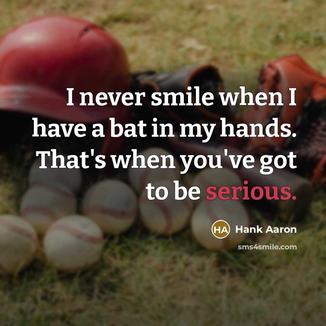 “I never smile when I have a bat in my…” quote by Hank Aaron