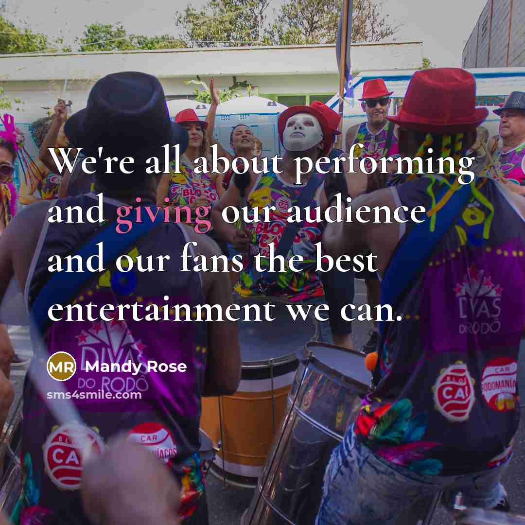 “We're all about performing and giving our audience and our…” quote by Mandy Rose