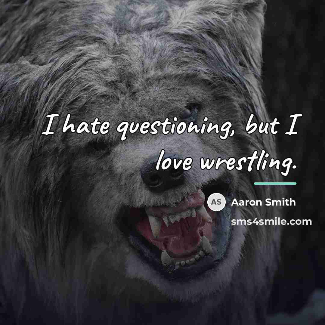 “I hate questioning, but I love wrestling.…” quote by Aaron Smith