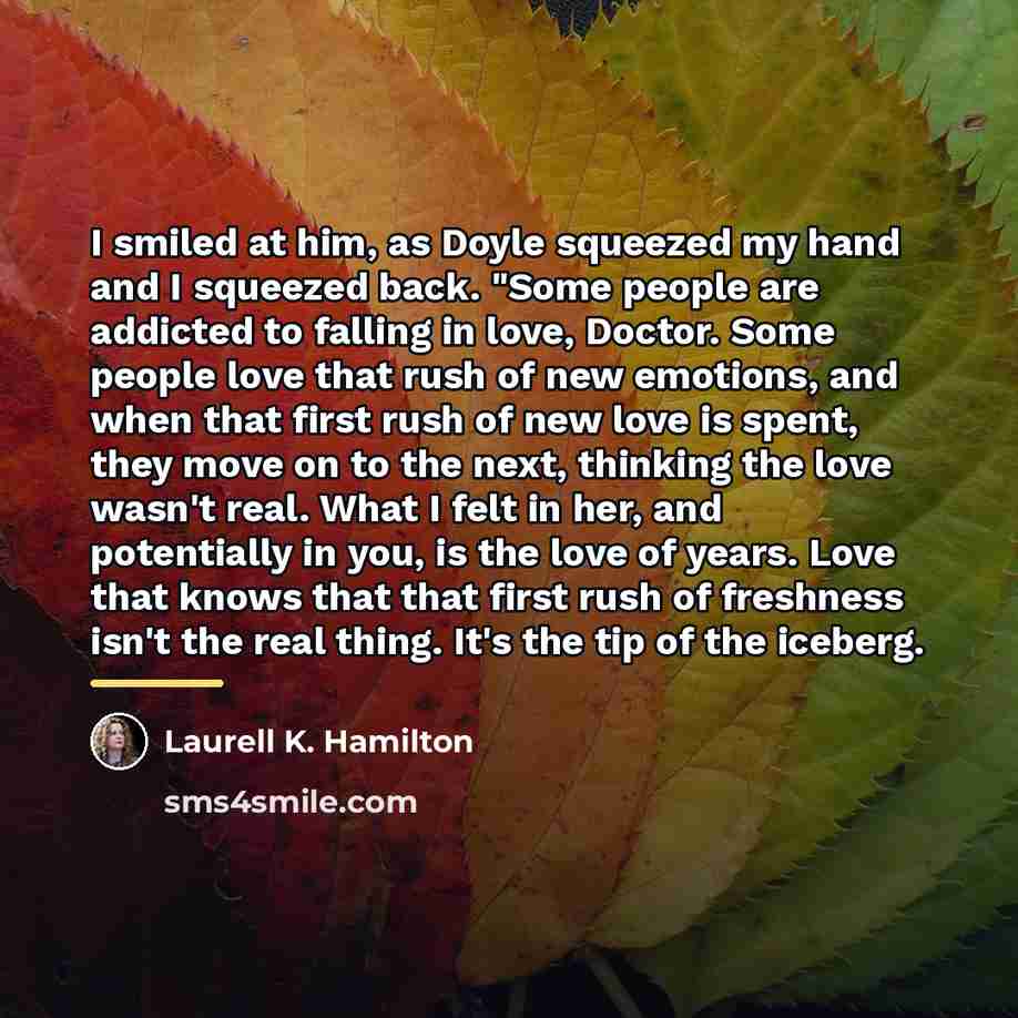 “I smiled at him, as Doyle squeezed my hand and…” quote by Laurell K. Hamilton