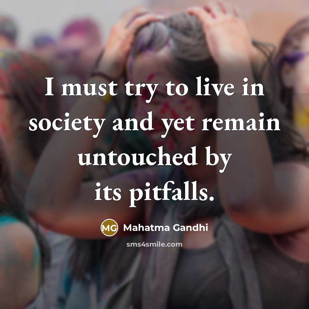 “I must try to live in society and yet remain…” quote by Mahatma Gandhi
