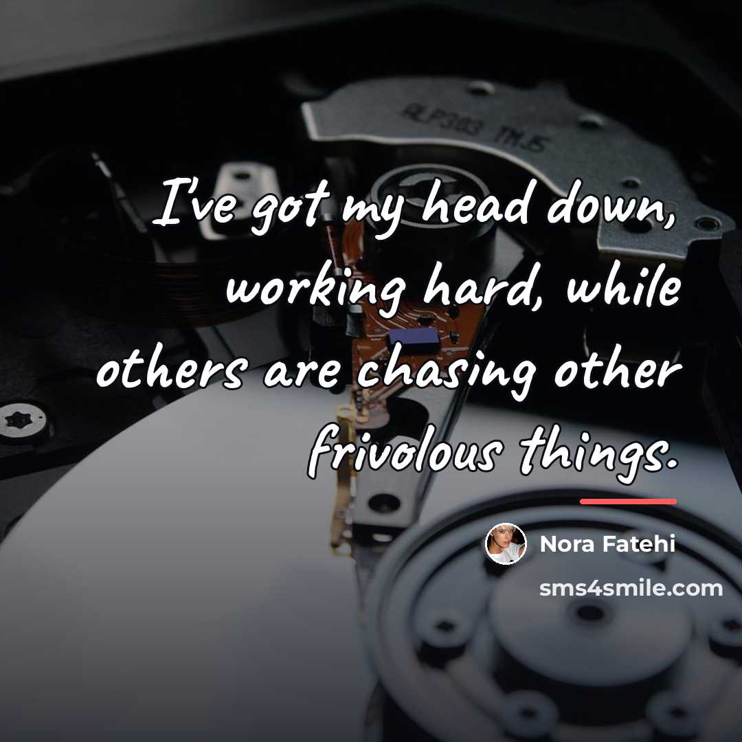 “I've got my head down, working hard, while others are…” quote by Nora Fatehi