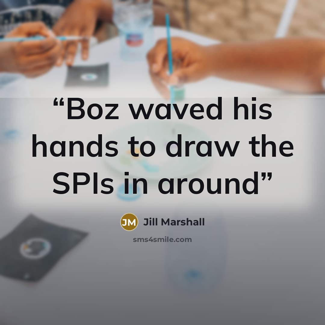 “Boz waved his hands to draw the SPIs in around” quote by Jill Marshall