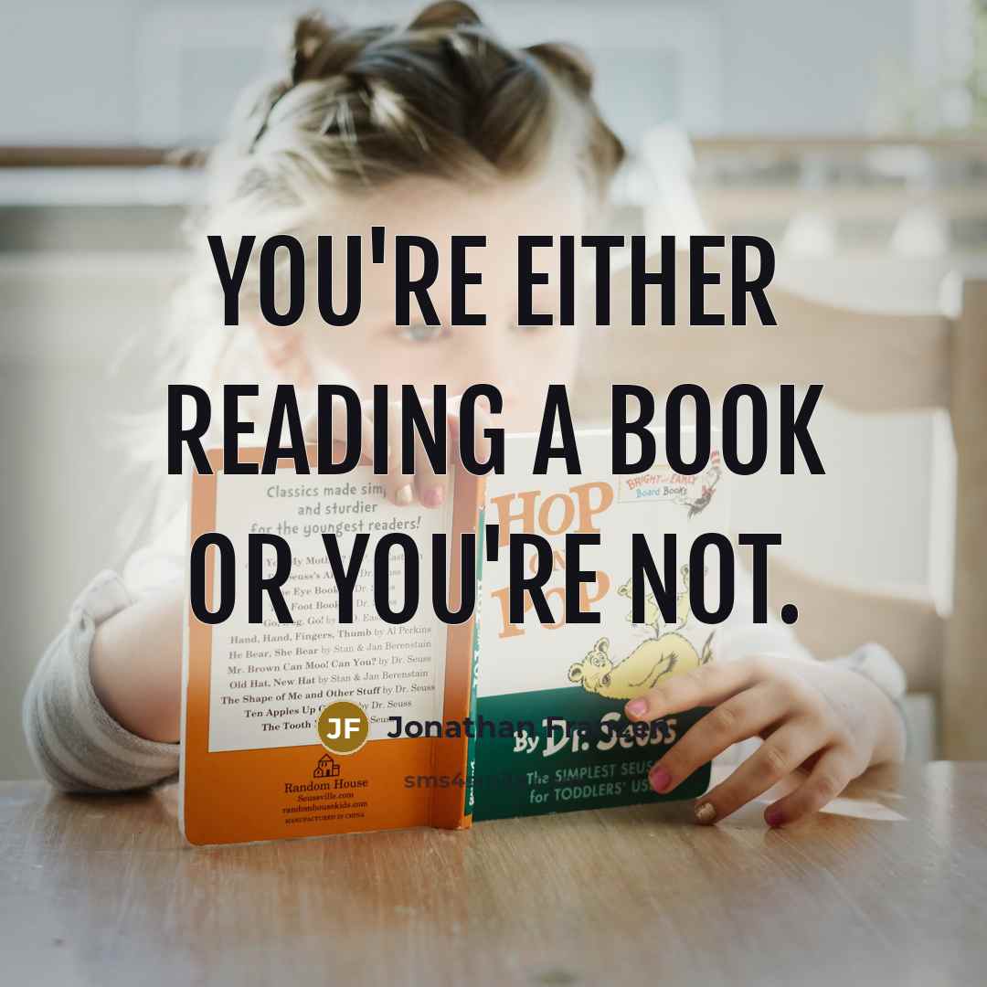 “You're either reading a book or you're not.…” quote by Jonathan Franzen