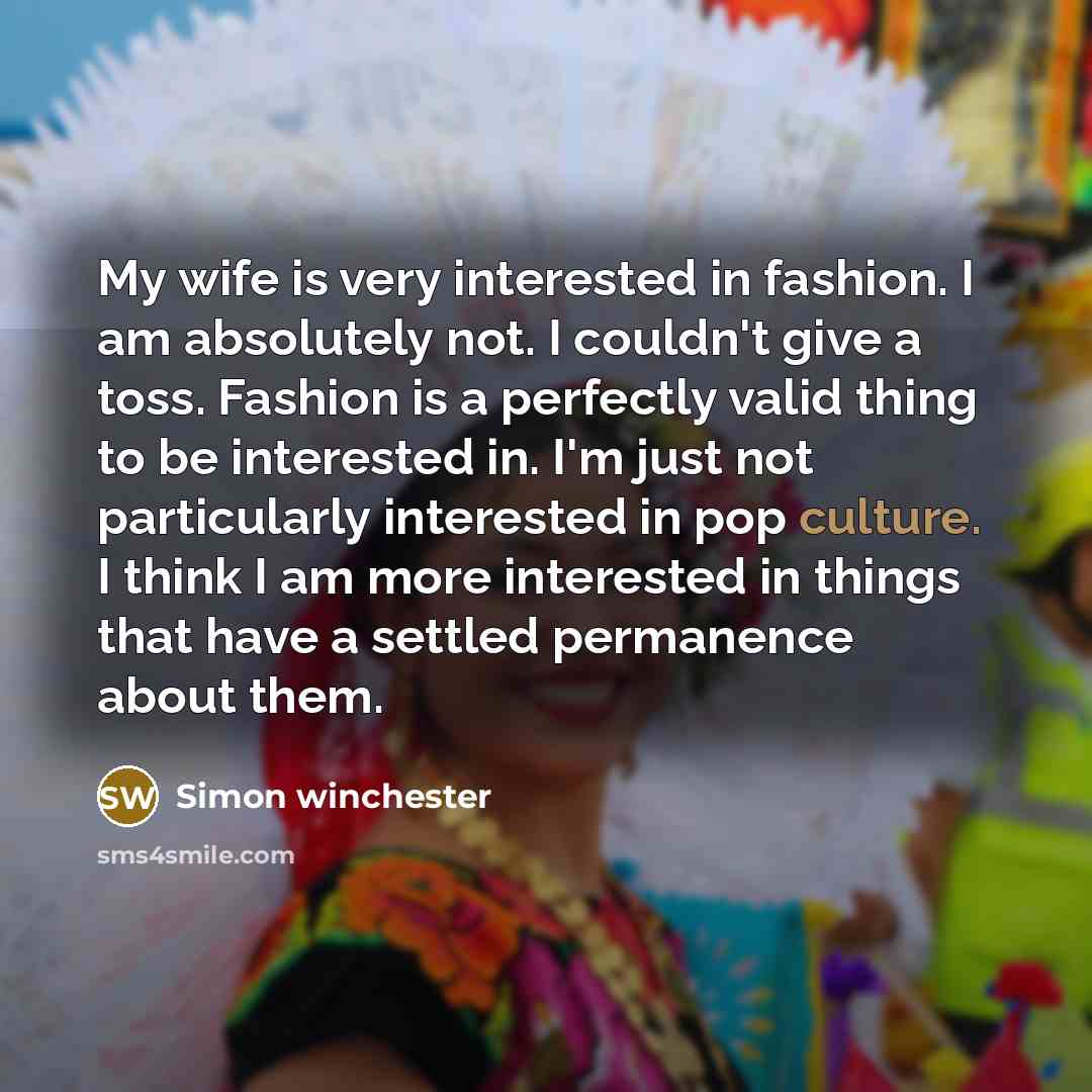 “My wife is very interested in fashion. I am absolutely…” quote by Simon Winchester