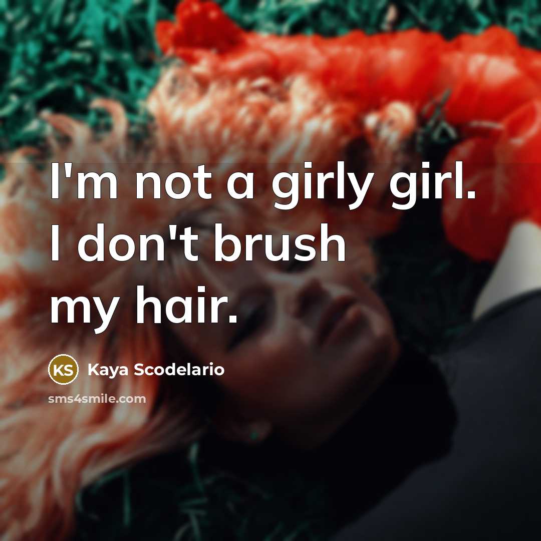 “I'm not a girly girl. I don't brush my hair.…” quote by Kaya Scodelario