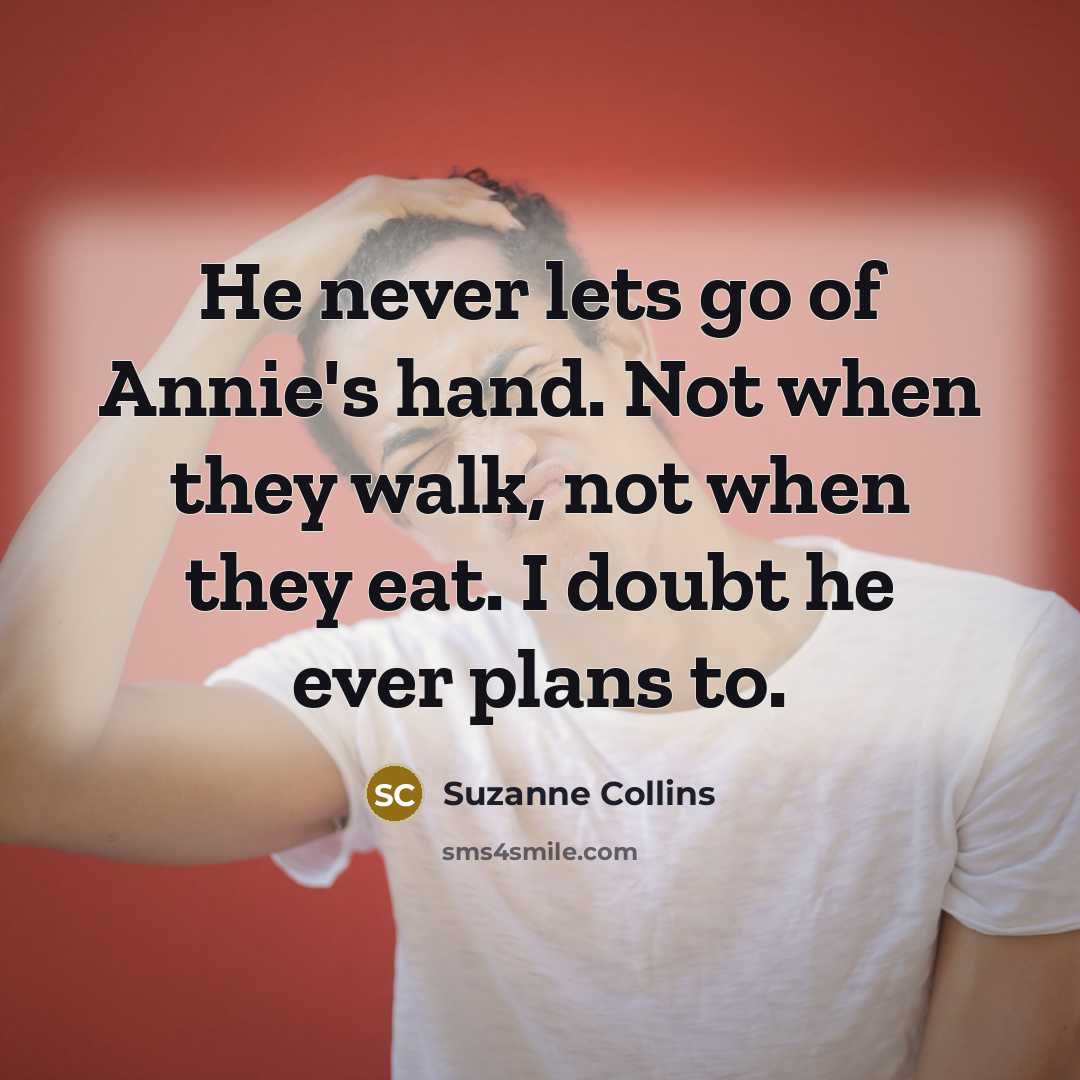 “He never lets go of Annie's hand. Not when they…” quote by Suzanne Collins