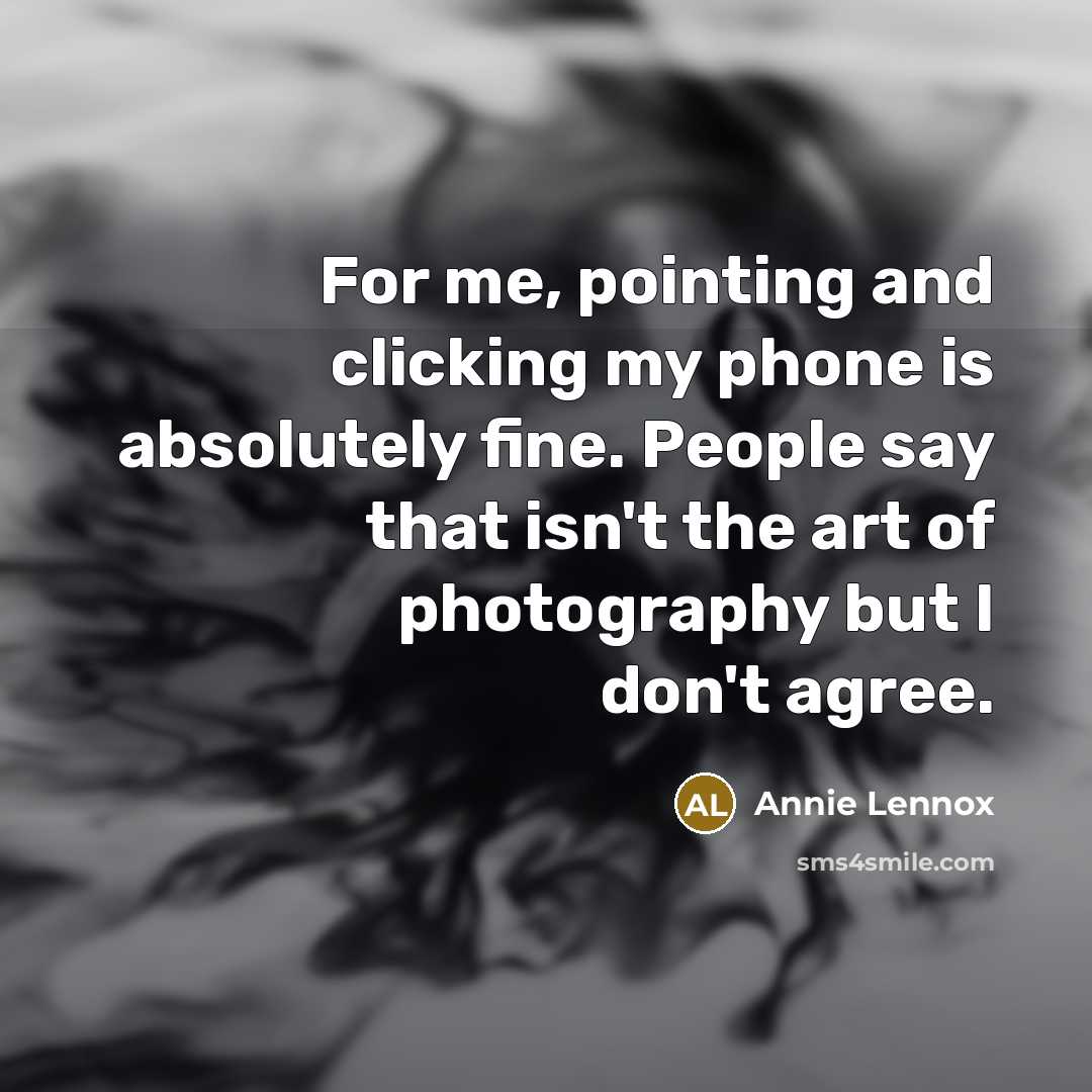 “For me, pointing and clicking my phone is absolutely fine.…” quote by Annie Lennox
