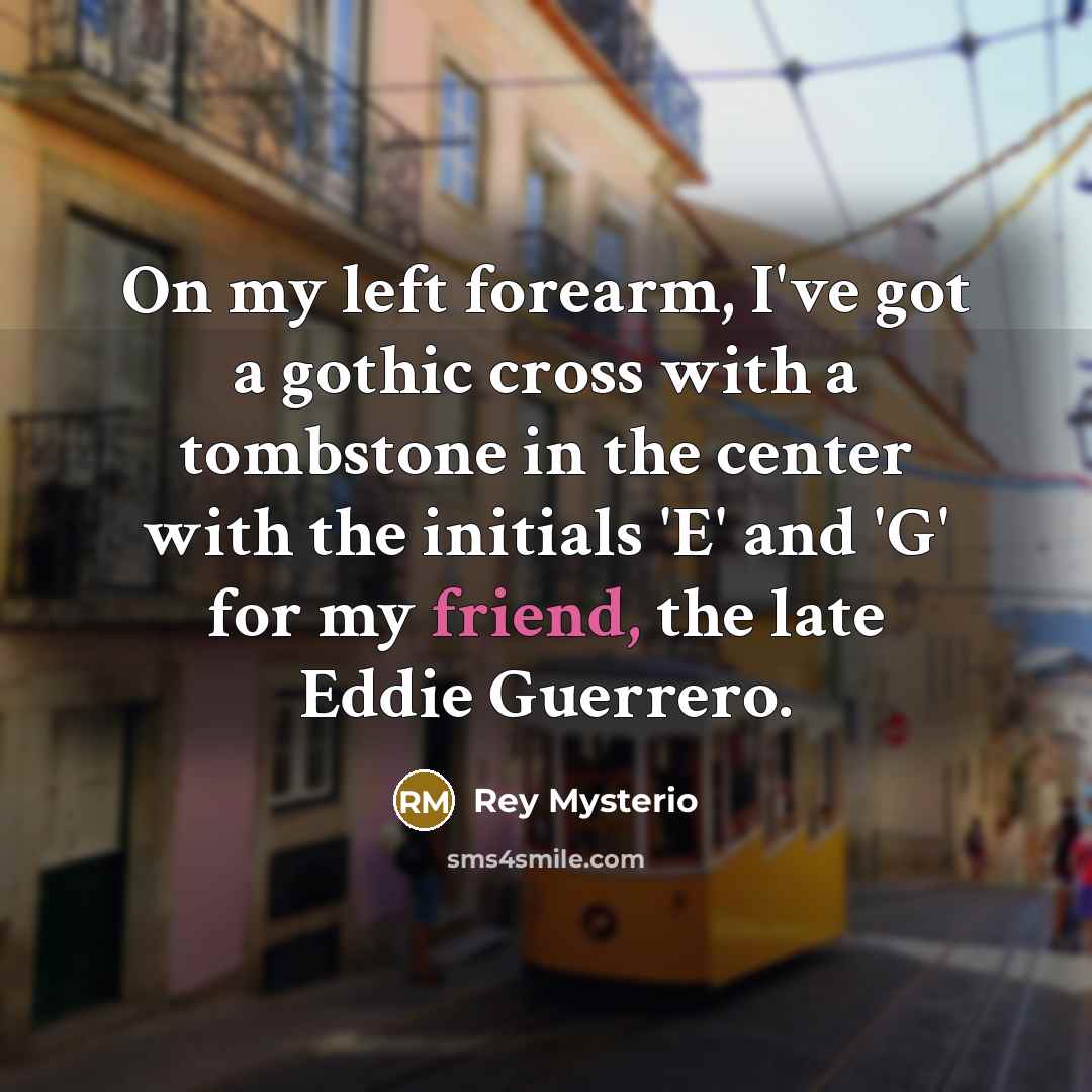 “On my left forearm, I've got a gothic cross with…” quote by Rey Mysterio