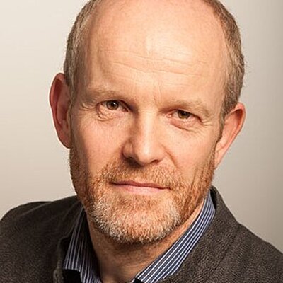 Portrait of Andrew Simms